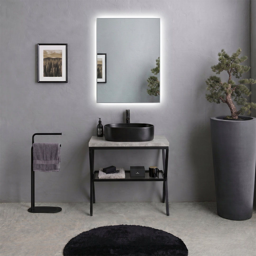 Cavalletto bagno in metallo nero opaco con mensola in vetro e top effetto beton visto frontalmente