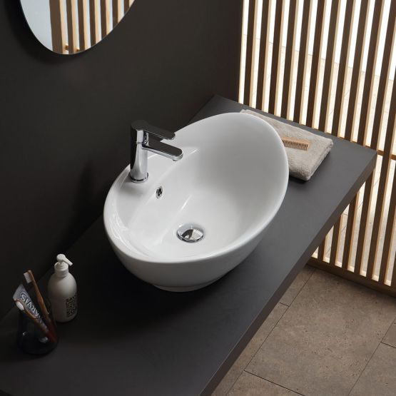 Lavabo da appoggio ovale in ceramica bianca